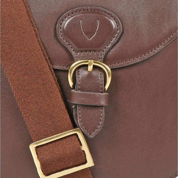 Hidesign Petra Leather Crossbody Bag with Saddle Shape and Faux Buckle Closure